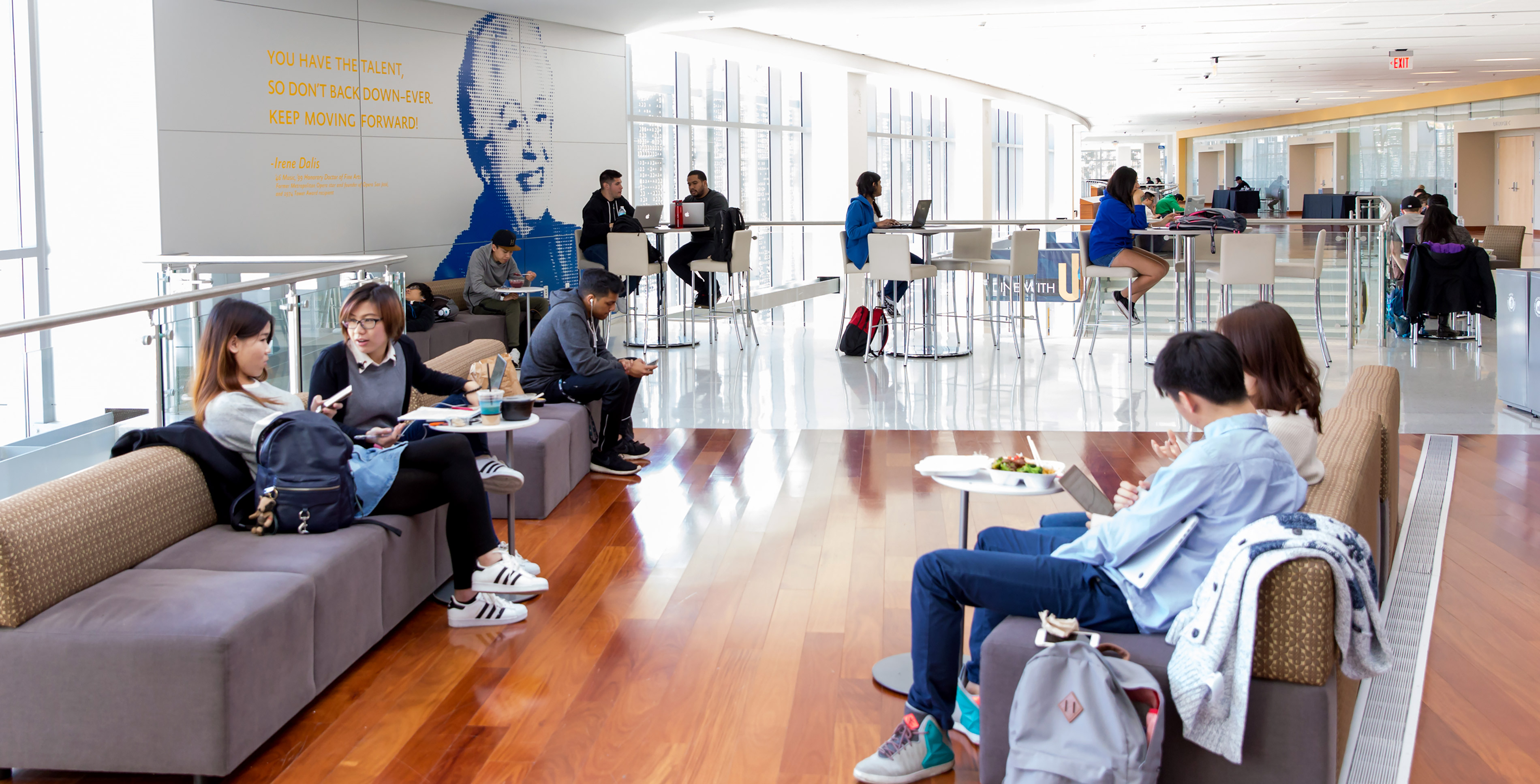 Students, faculty and staff enjoying the lounge area in the student union.