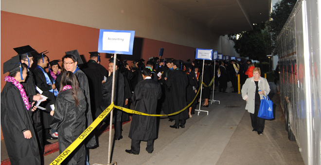 #htmlcaption1 Students line-up between event center and music building