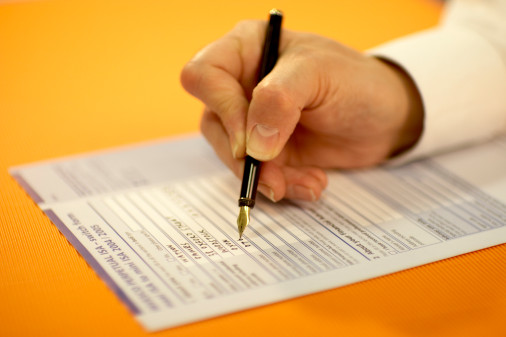 man filling out a blank form