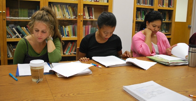 #htmlcaption5 Students Studying