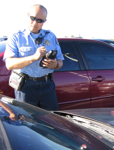 parking officer on patrol