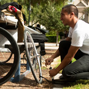 Student Checking His Bike