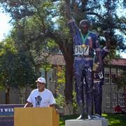 Man Making a Speech At Smith Carlos Statue Outside Clark Hall