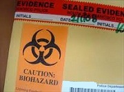 Sealed Evidence Envelop with Caution: BIOHAZARD, initials, date,