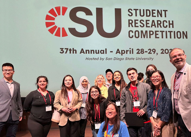SJSU student participants posing with vice president for research and innovation