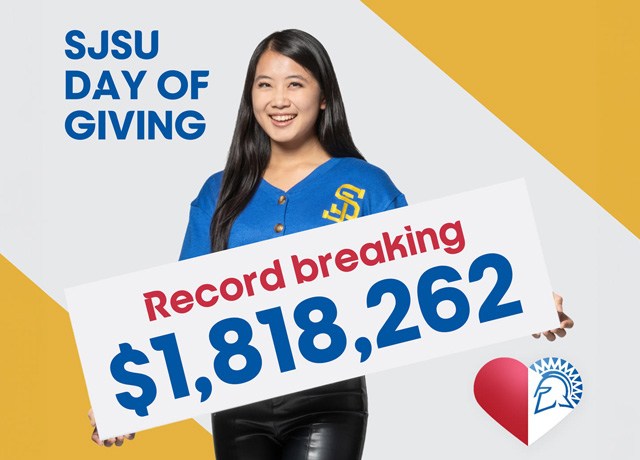 SJSU student holds up a sign that reads Record Breaking $1,818,262.