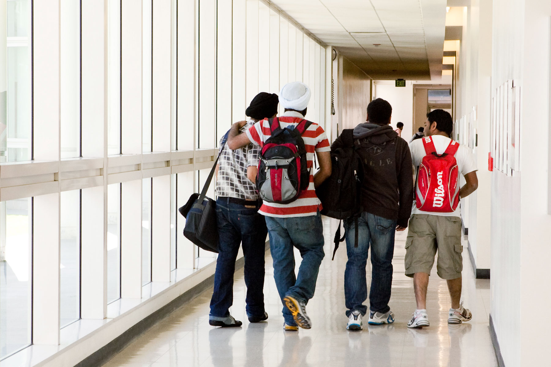 Students walking in the hall of the engineering building.