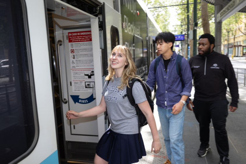 Students walking into a VTA train