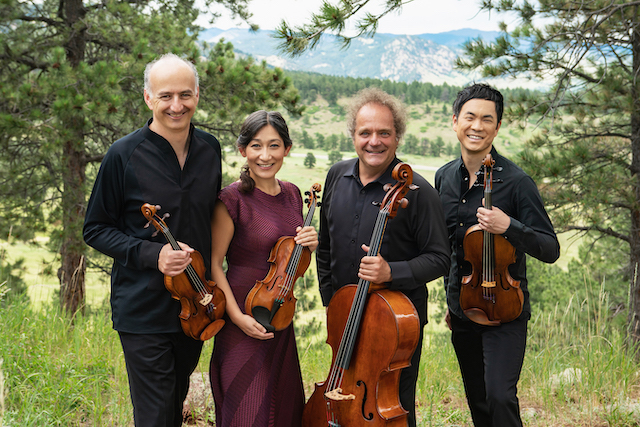 Image of the four members of the Takacs Quartet