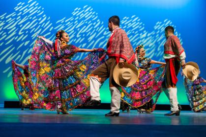 Groupo Folklorico dancers dance on stage