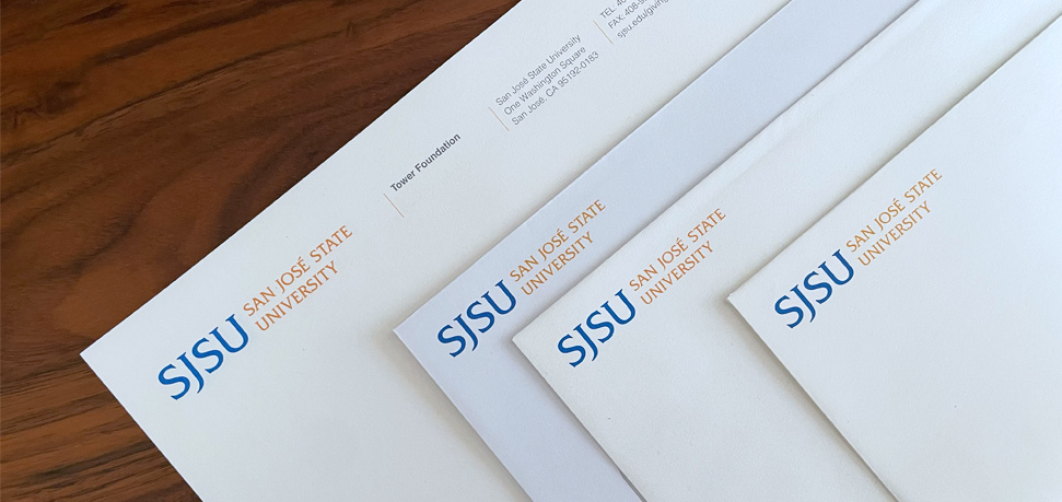 Stationary samples of letterheads and envelopes with SJSU identity.