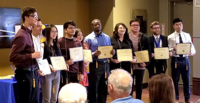 Department Honors students posing with awards.