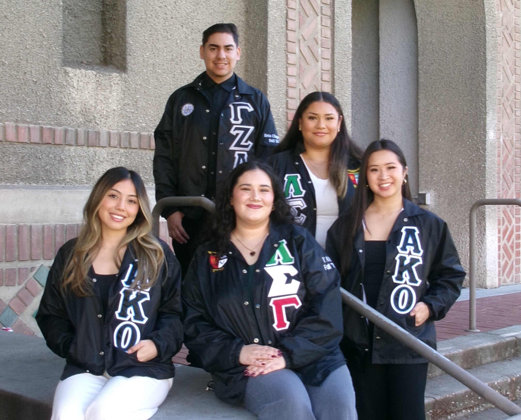 Group of students with USFC banner