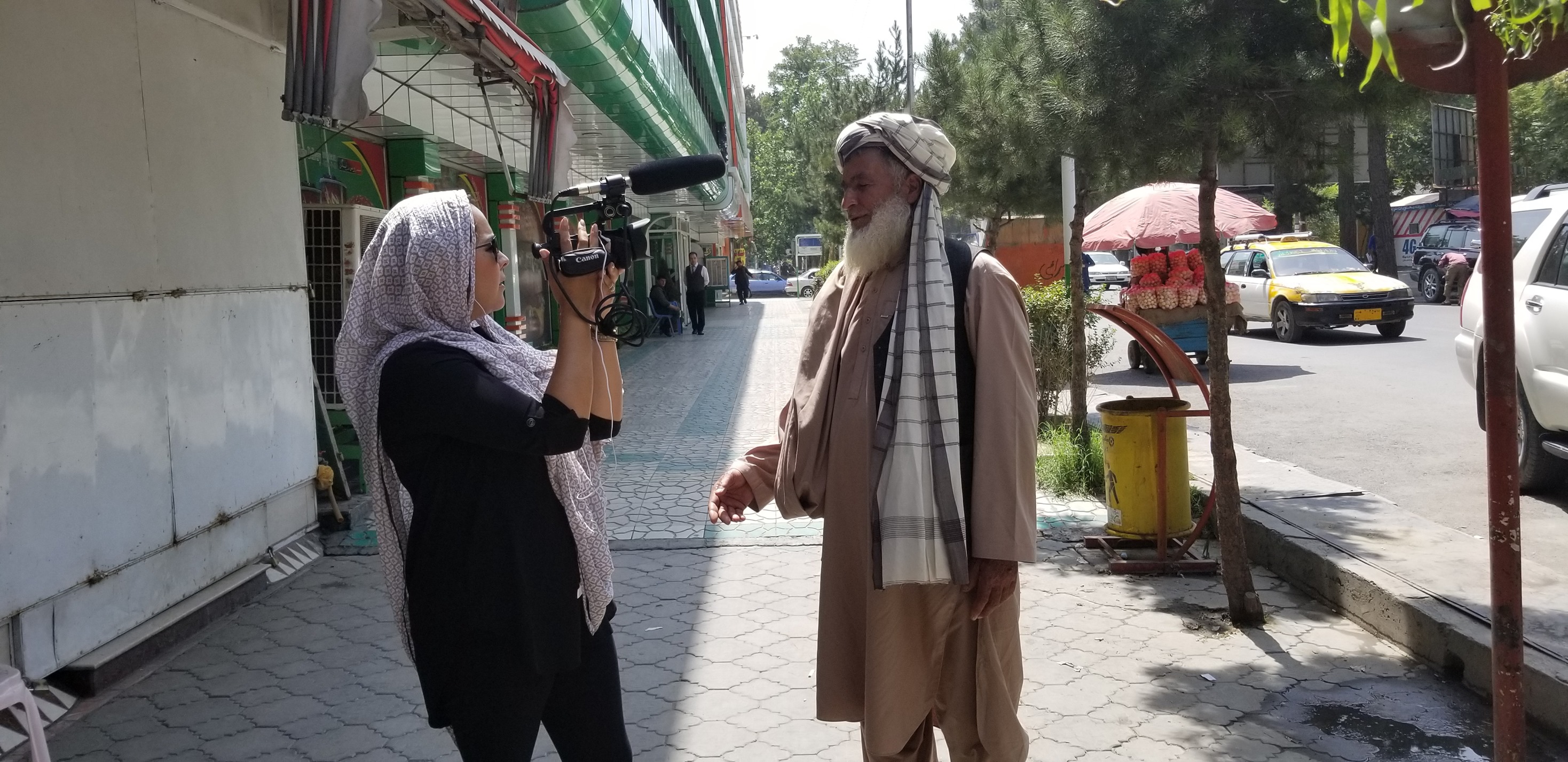 Halima Kazem filming an interview in Kabul 2019