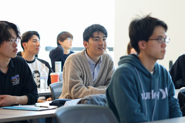 International SJSU student listening to a lecture