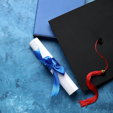 Photo of graduation cap and diploma