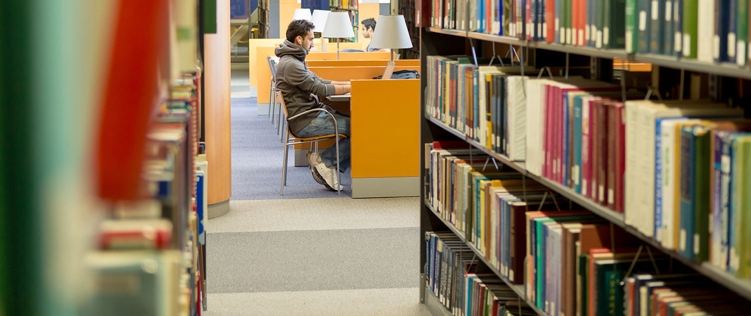Student studying in a library