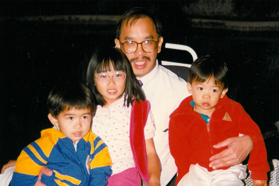 Lawrence Fan with his niece and two nephews. Chinese American man, children