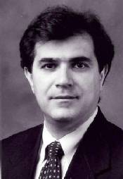 black and white headshot of Dr. Fred Barez