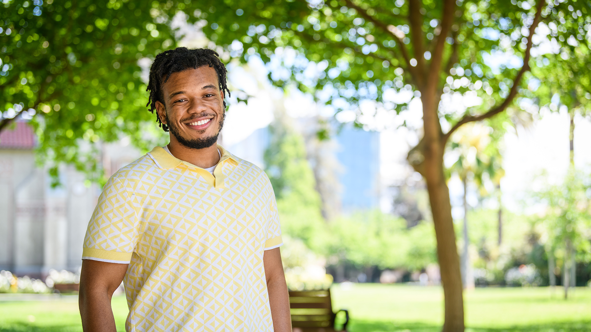 SJSU student posing in front of quad