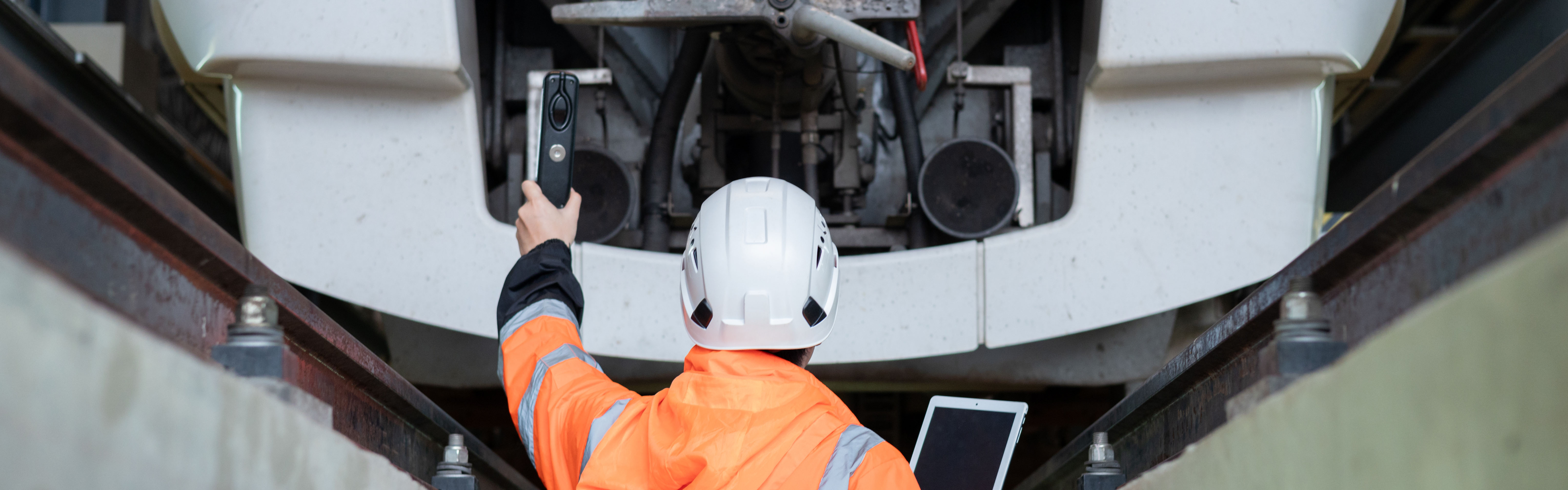 Train engineer inspecting train