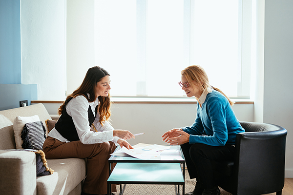 A female financial advisor with a client