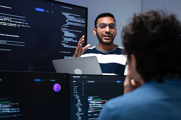Male software engineer leading a workshop