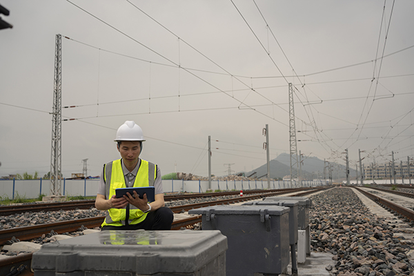 Railroad inspector on tablet