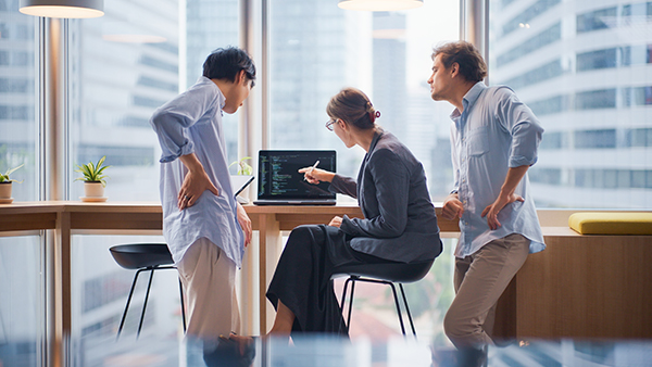 Software engineers collaborating