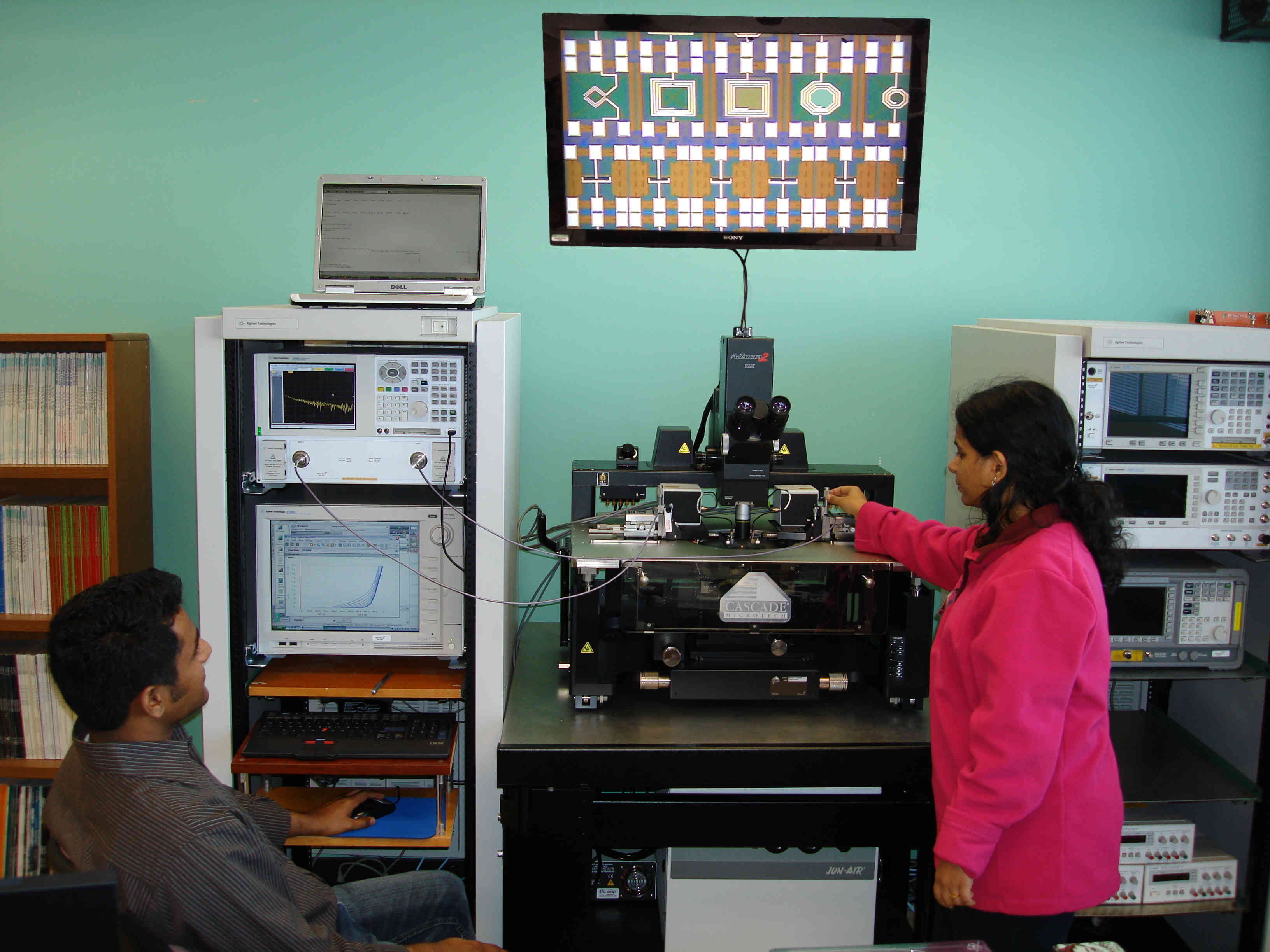 Pallavi and Vijayandra are measuring test structures for high frequency modeling and noise characterization.