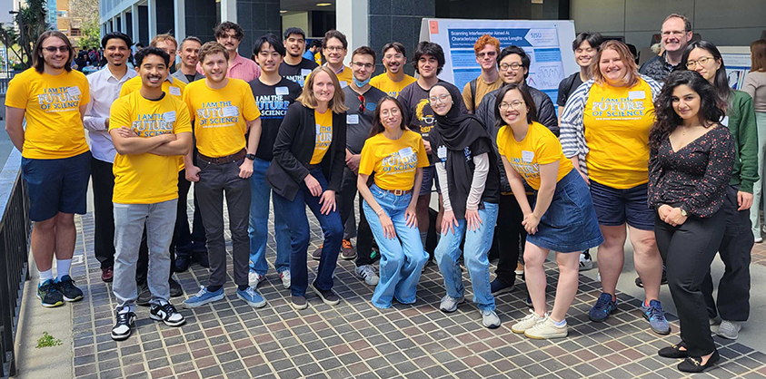 Group photo of physics and astronomy students and faculty members at the CoS SRD poster session.