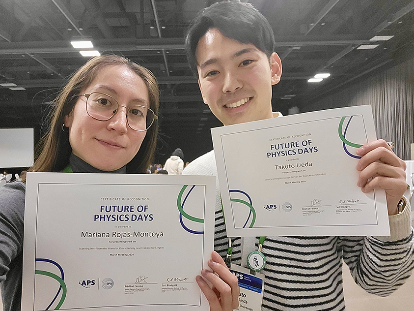 Photograph of Mariana Rojas-Montoya and Takuto Ueda holding up March Meeting participation certificates.