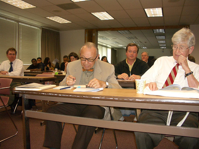 Buzanski and Norton photograph in a Senate meeting.