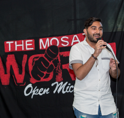Student speaking at MOSAIC Open Mic Night