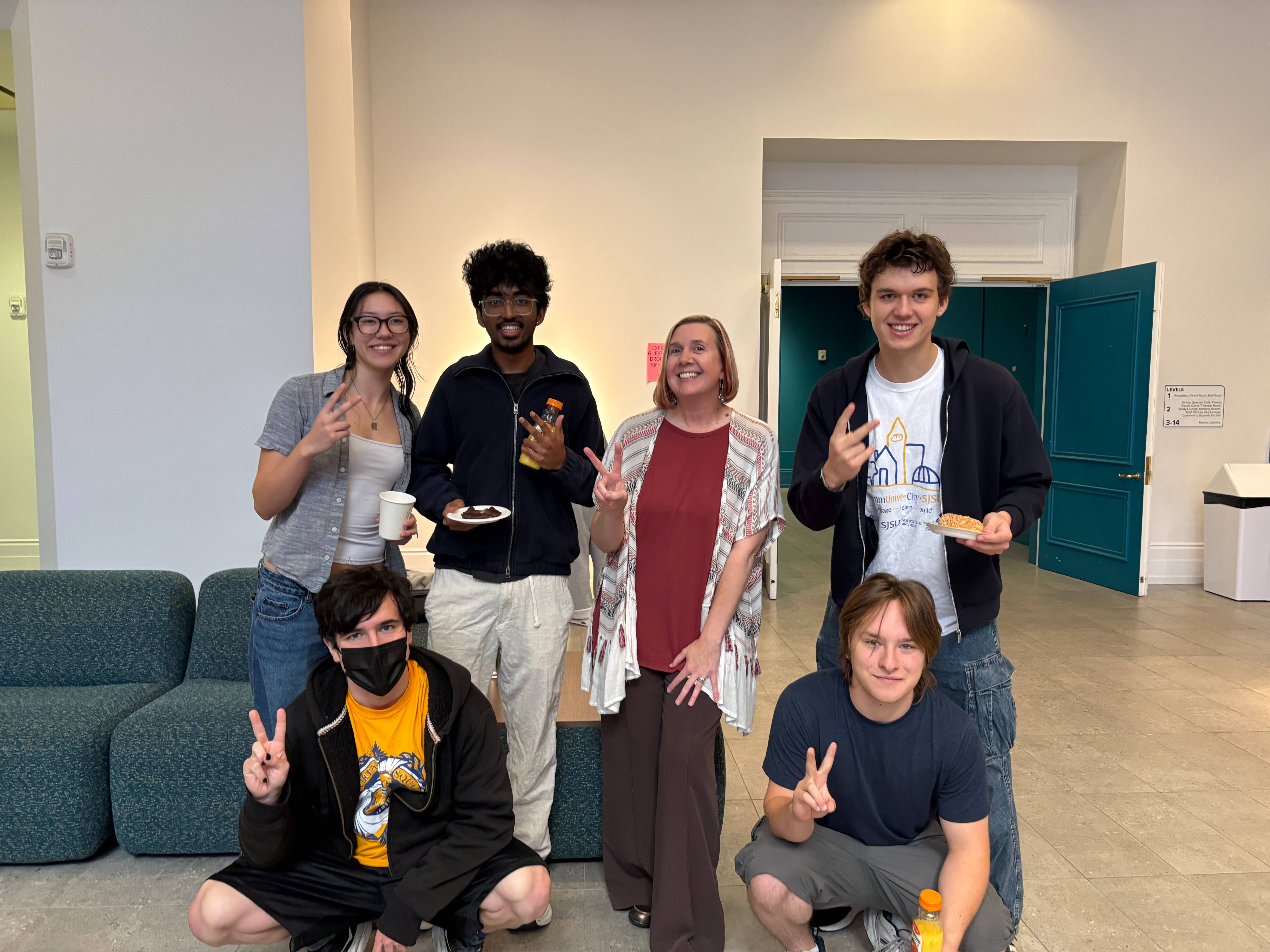 Dean of Students, Heather French, poses with students who attended her event "Donuts with the Dean" in October, 2025. 