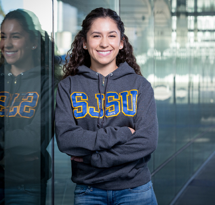 Smiling female SJSU student in sweatshirt