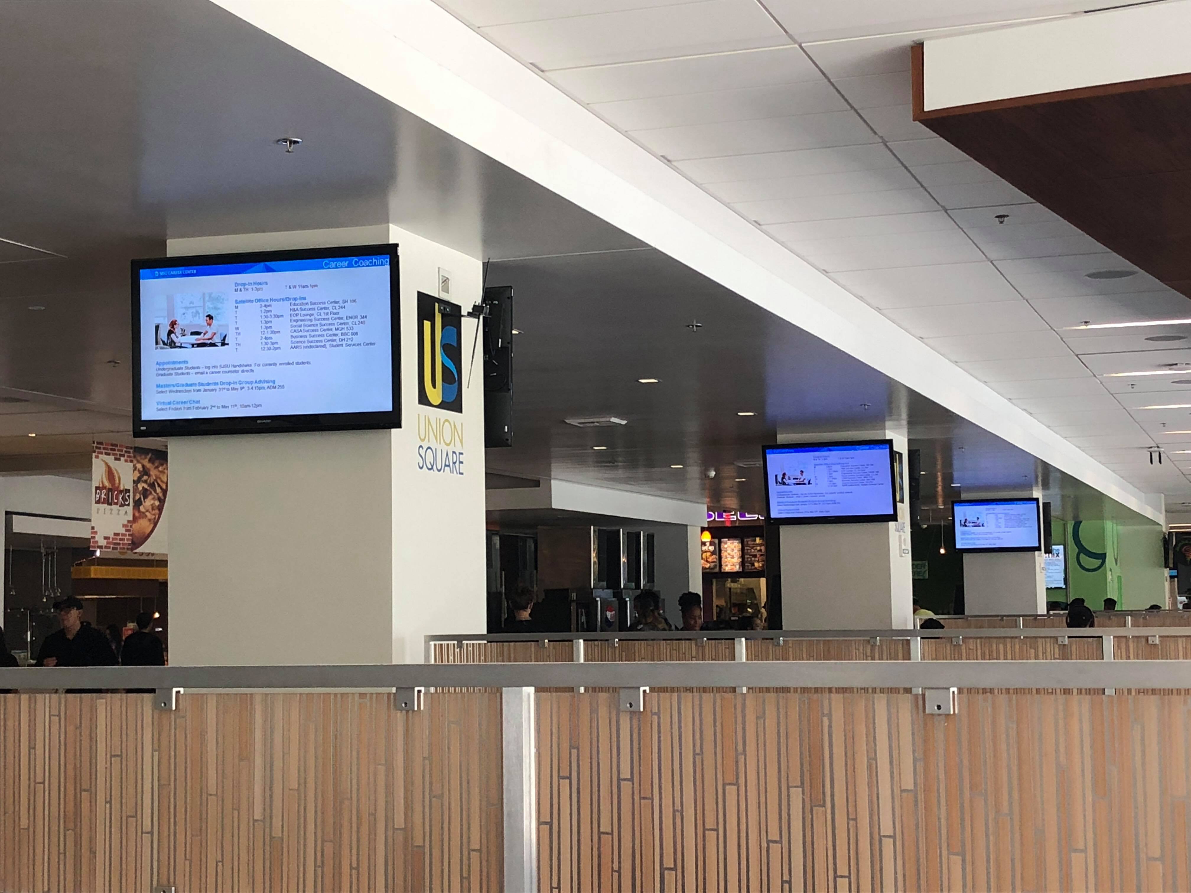 A picture of a digital screen located inside the Student Union.
