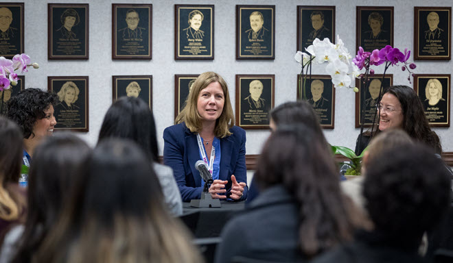 a female engineer speaks to current students