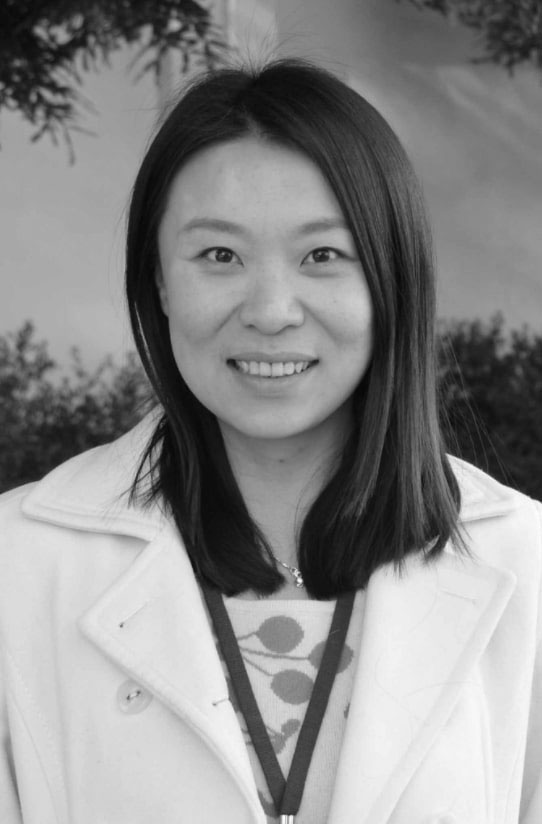Photo of Dr. Qi Wang in black and white