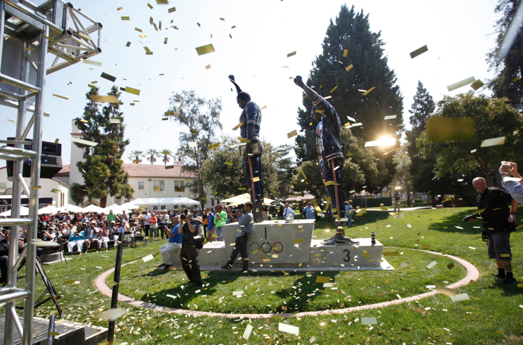 "Victory"sculpture reveal event with confetti in the air.